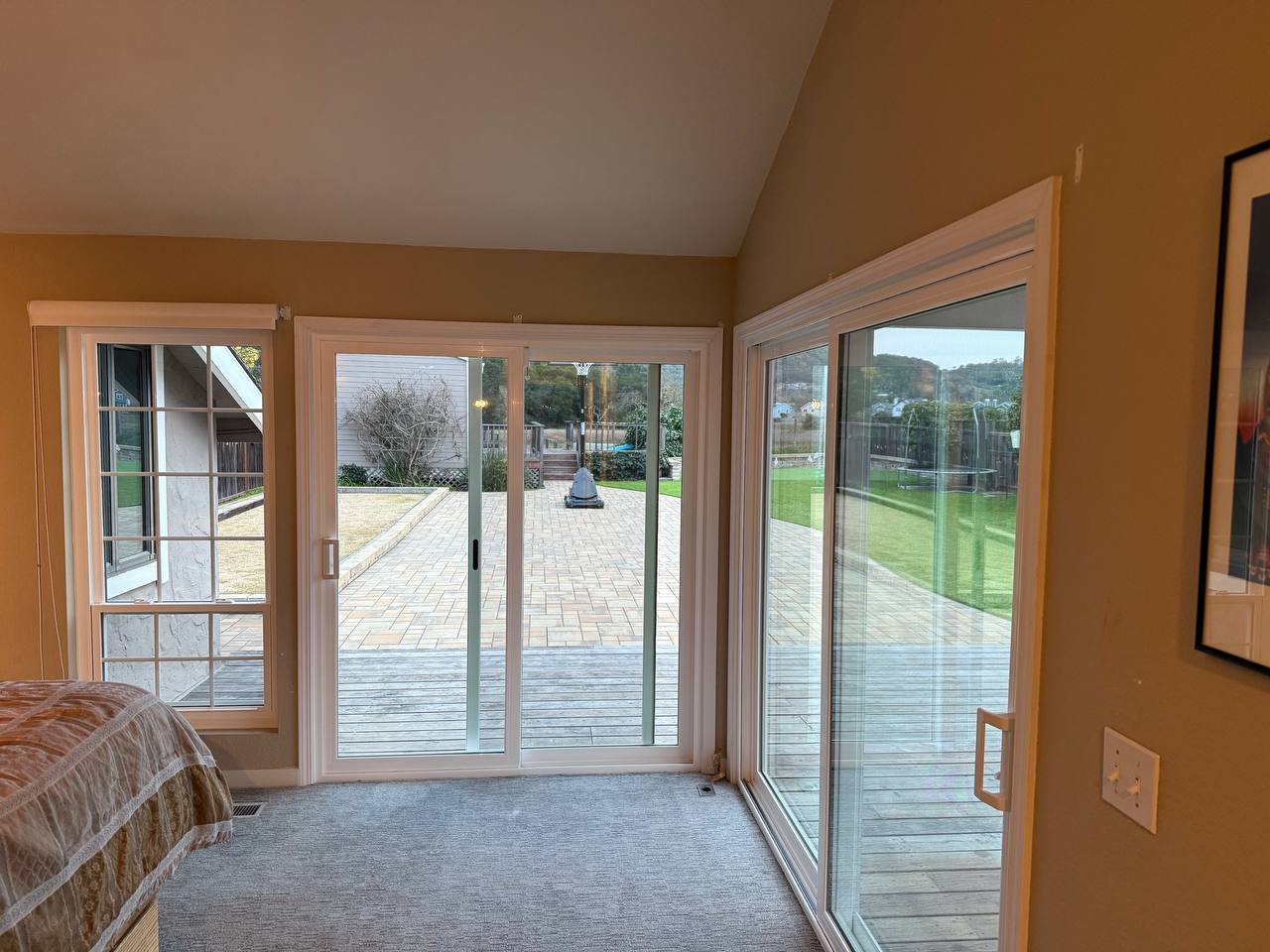 Bay Area home interior with sliding glass doors opening to backyard